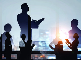Group of business people outlines with lit background
