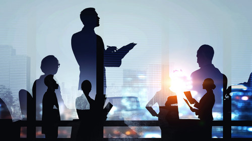 Group of business people outlines with lit background