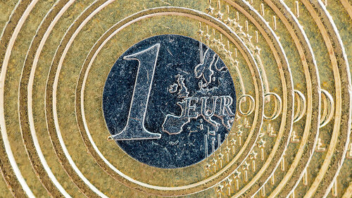 abstract coin image of one euro as a financial symbol
