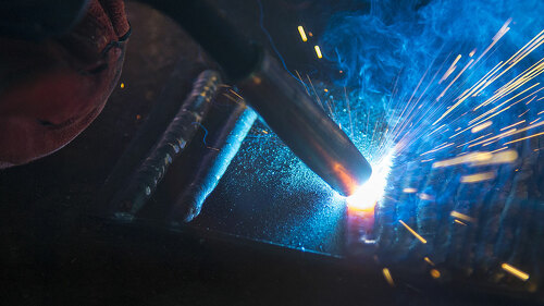 Close-up of the sparking light of the welding process.Sparking l