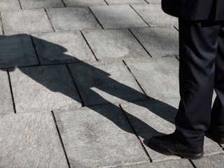 Shadow of a businessman standing