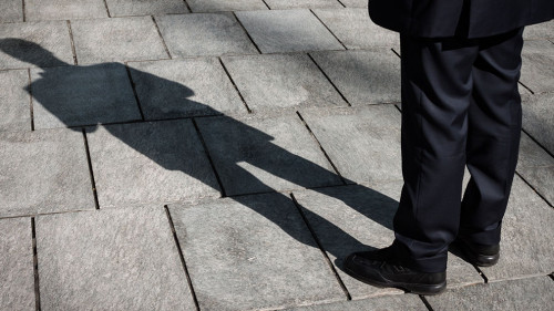 Shadow of a businessman standing