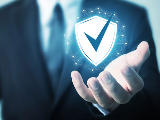 Protection network security computer and safe your data concept, Businessman holding shield protect icon