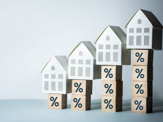 Real estate or property risk concepts with percentage sign and h