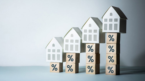 Real estate or property risk concepts with percentage sign and h
