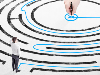 Businessman in front of labyrinth