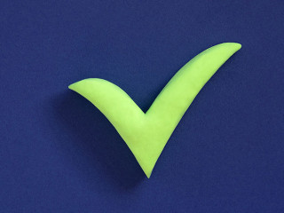 Checkmark sign on blue background. Concept of well done, confirm