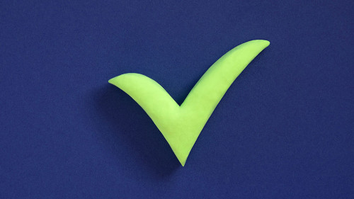 Checkmark sign on blue background. Concept of well done, confirm
