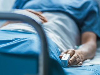 In the Hospital Sick Male Patient Sleeps on the Bed. Heart Rate