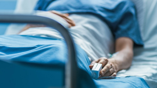 In the Hospital Sick Male Patient Sleeps on the Bed. Heart Rate