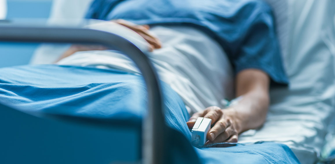 In the Hospital Sick Male Patient Sleeps on the Bed. Heart Rate
