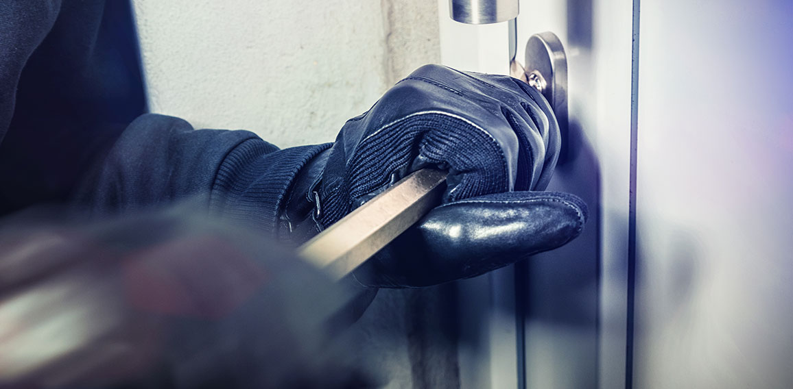 masked burglars breaking and entering into a victim's home