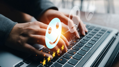 Customer service satisfaction survey concept.Business people or customers show satisfaction through the application on the tablet screen. By giving the most satisfaction rating and 5 stars.