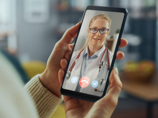 Close Up of a Female Chatting in a Video Call with Her Black Mal