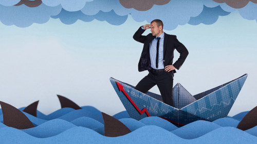 Businessman looking for new opportunities and sailing in stormy