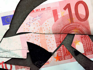 Euro banknote cut on parts.
