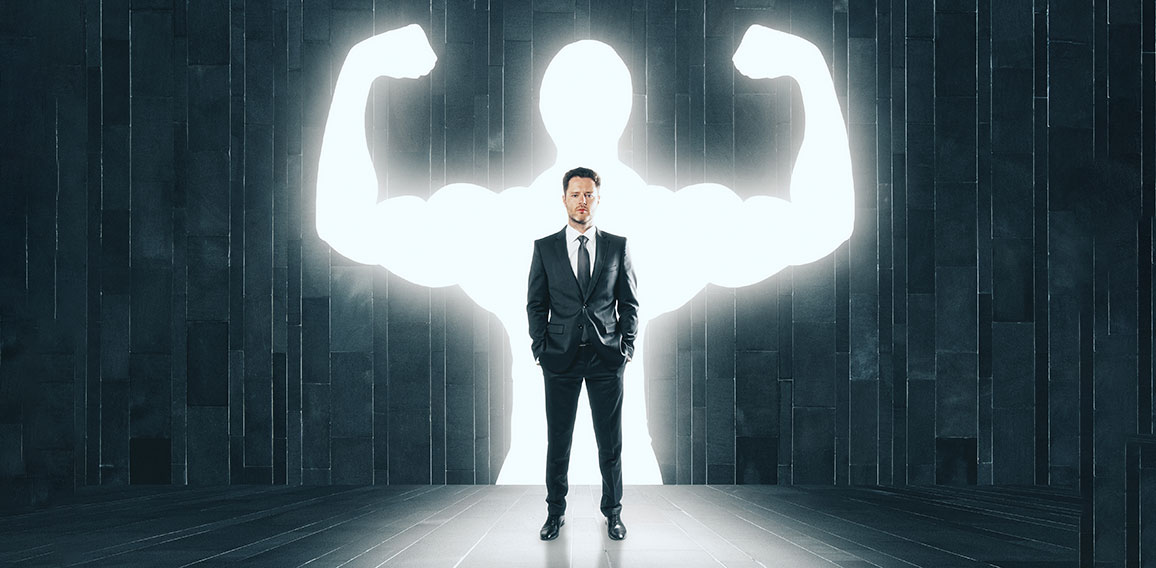 Businessman with muscly arms