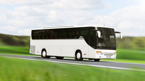 white bus on highway