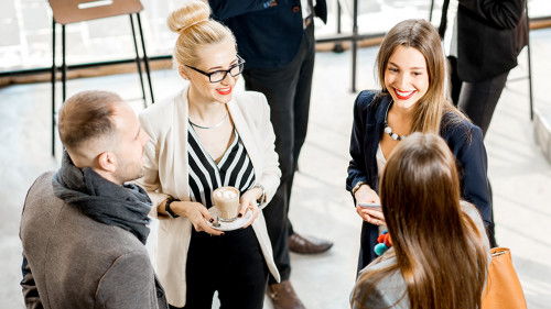 Business people talking indoors