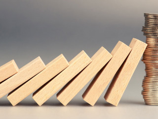 Money coins heap still balance and stop the falling domino, fina