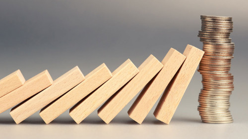 Money coins heap still balance and stop the falling domino, fina