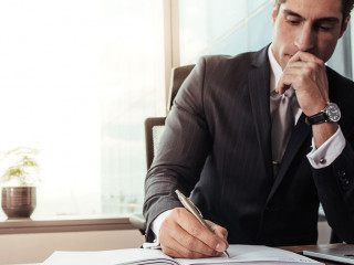 Male entrepreneur working at his desk
