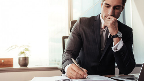 Male entrepreneur working at his desk