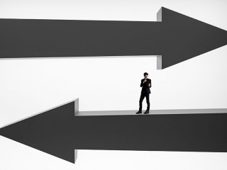 Businessman on black arrows