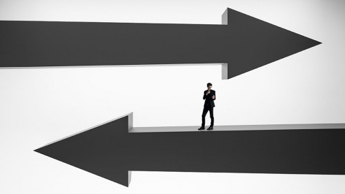 Businessman on black arrows