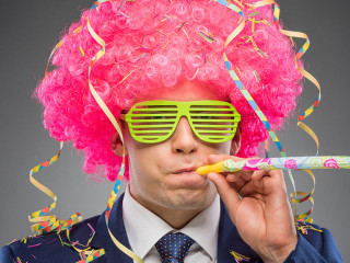 Funny businessman in pink wig