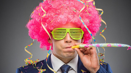 Funny businessman in pink wig