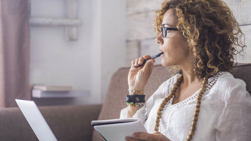 nice woman type on a laptop working at home freedom and happy. t