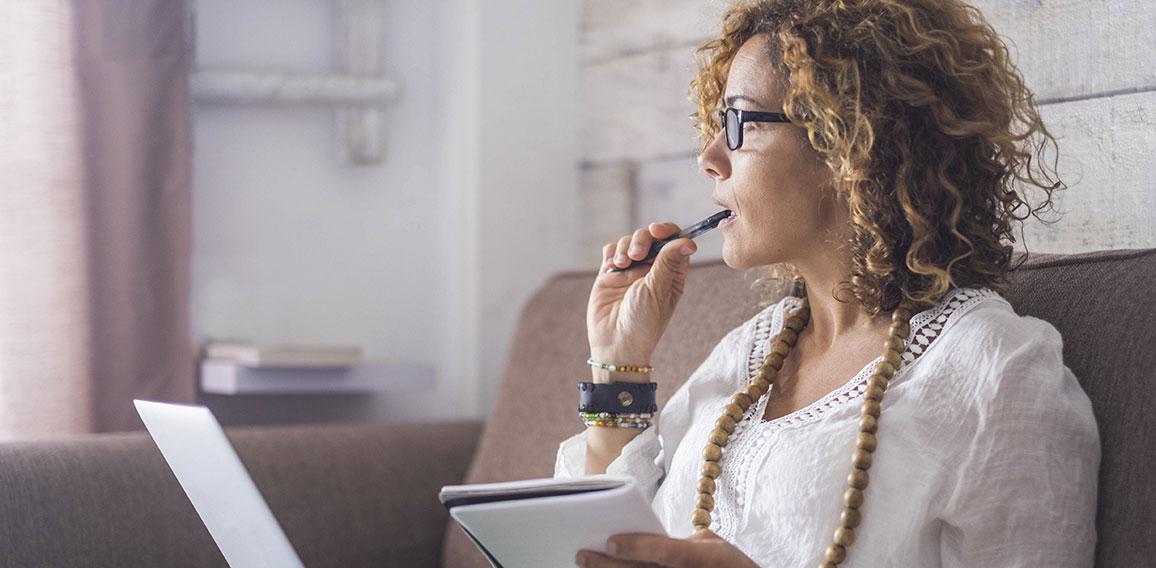 nice woman type on a laptop working at home freedom and happy. t