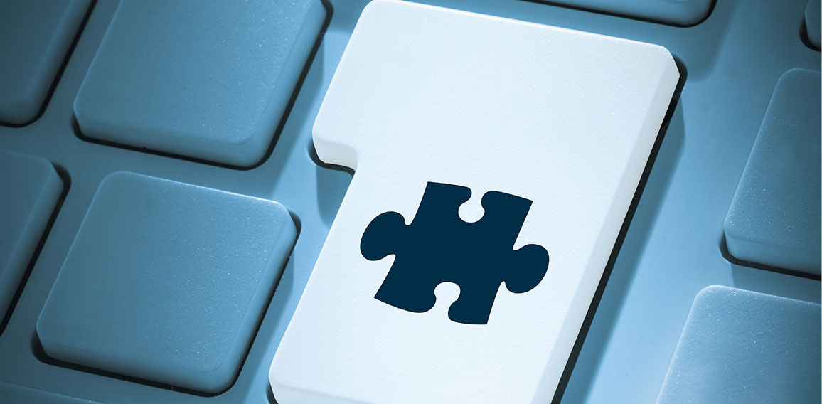 Composite image of jigsaw piece on enter key