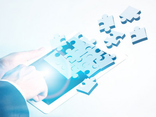 Tablet with puzzle pieces