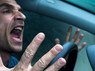 Angry driver in his carl