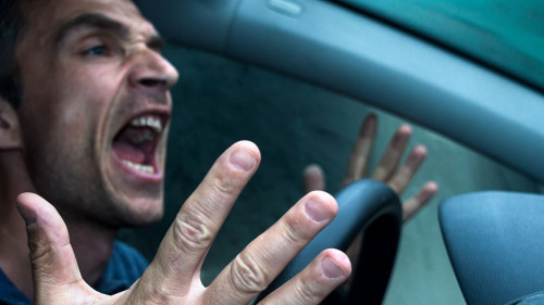 Angry driver in his carl