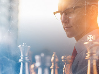 business man strategy brainstorm chess board game with hand touc