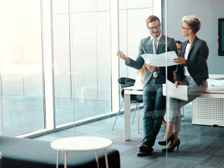 Business colleagues collaborating and discussing project plans