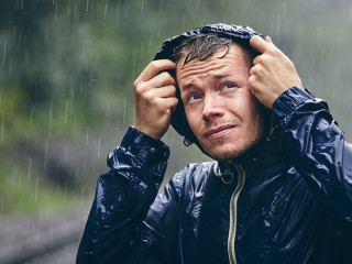 Traveler in heavy rain