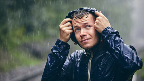 Traveler in heavy rain