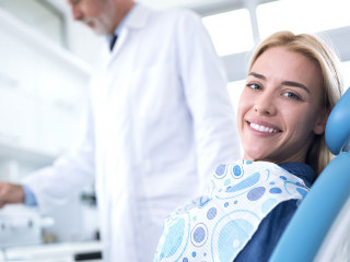 Smiling and happy young woman after successful treatment