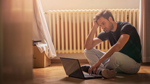 Young poor man, hard working freelancer or a depressed student,