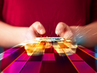 Woman holding smartphone with futuristic lines