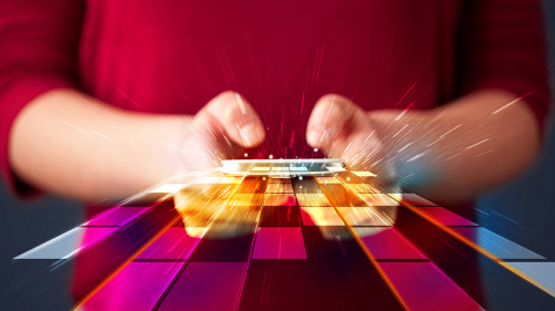 Woman holding smartphone with futuristic lines