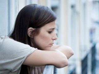 young sad beautiful woman suffering depression looking worried a