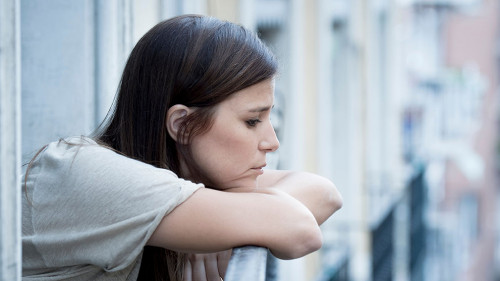 young sad beautiful woman suffering depression looking worried a