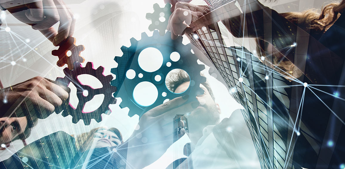 Business team connect pieces of gears. Teamwork, partnership and integration concept. double exposure with network effects