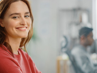 Portrait of Beautiful Young Woman with Red Hair Wearing Yellow S