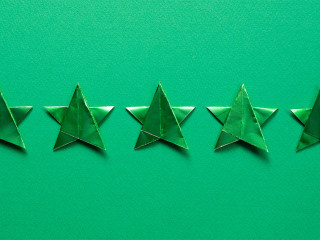Five stars quality rating on blue background